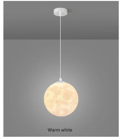 A warm white nordic led moon pendant light with a smooth surface for dining room kitchen and bar decor
