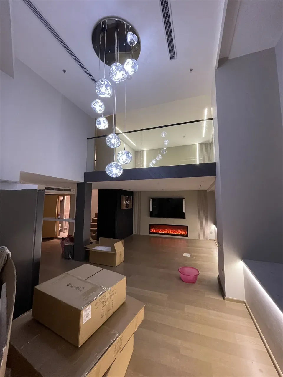 Modern nordic led pendant light with spherical glass globes and circular metallic frame for indoor living room lighting