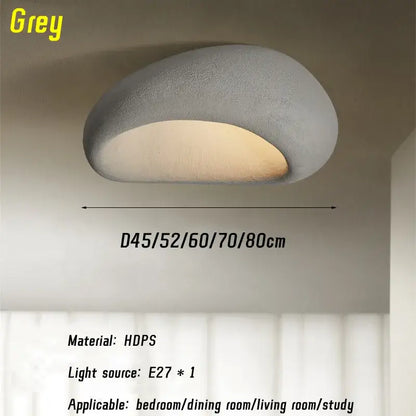 A modern matte grey hdps nordic ceiling light with smooth stone-like design and integrated e27 bulb for bedroom use