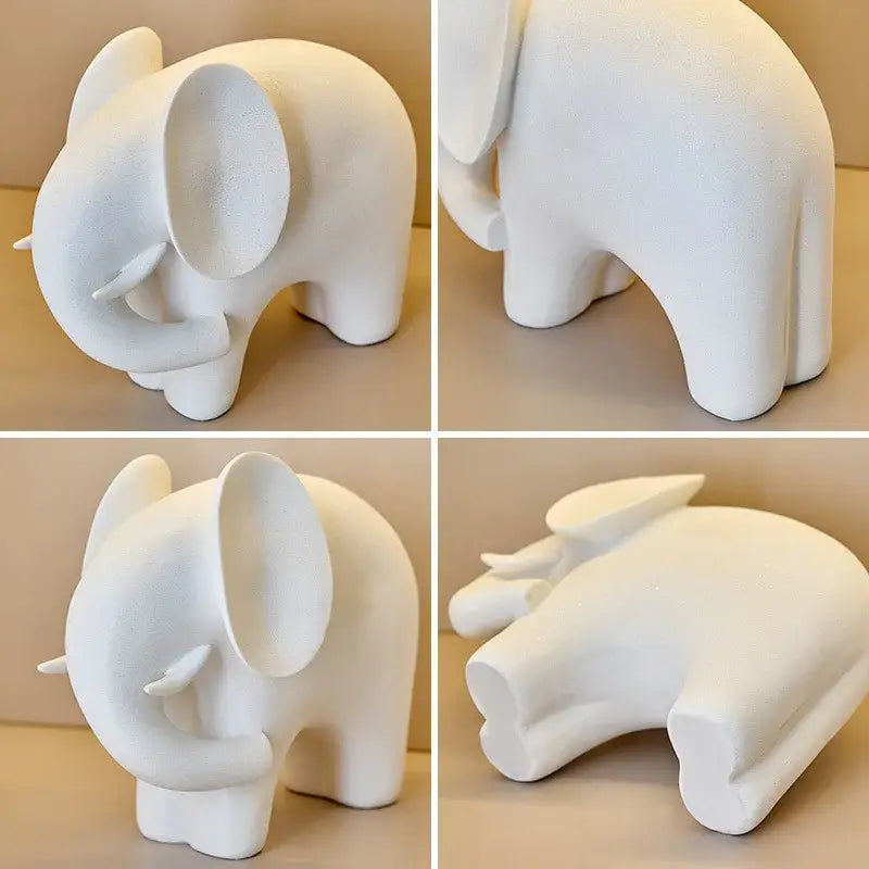 White ceramic elephant resin statue with smooth matte finish and minimalist design for living room decorbites elephant decor