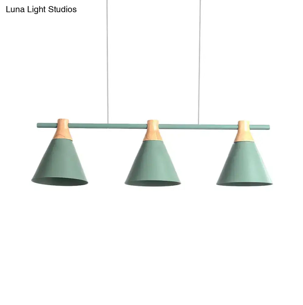 Modern mint green metal pendant light with wooden accents from DecorBites™ perfect for kitchen island lighting