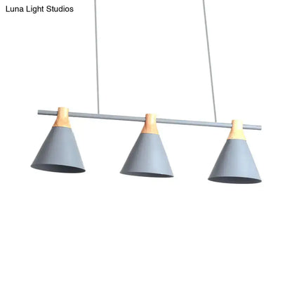 Modern gray and wood metal pendant light fixture with three green conical shades for kitchen island lighting