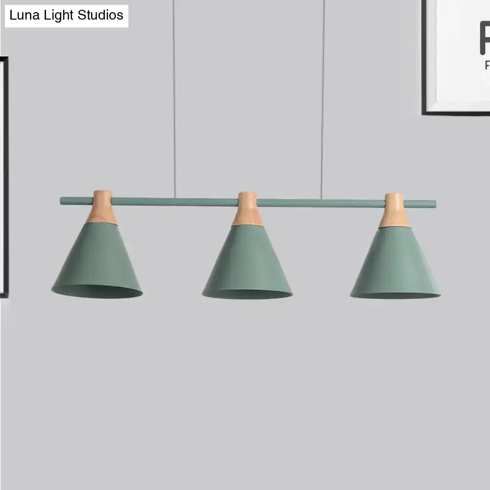 Modern mint green pendant light with wooden accents in a sleek nordic metal hanging chandelier for kitchen island lighting