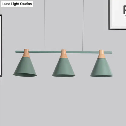 Modern mint green pendant light with wooden accents in a sleek nordic metal hanging chandelier for kitchen island lighting
