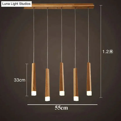 Nordic minimalist wood pendant lamp with five vertical tapered wood rods and white acrylic ends for dining room