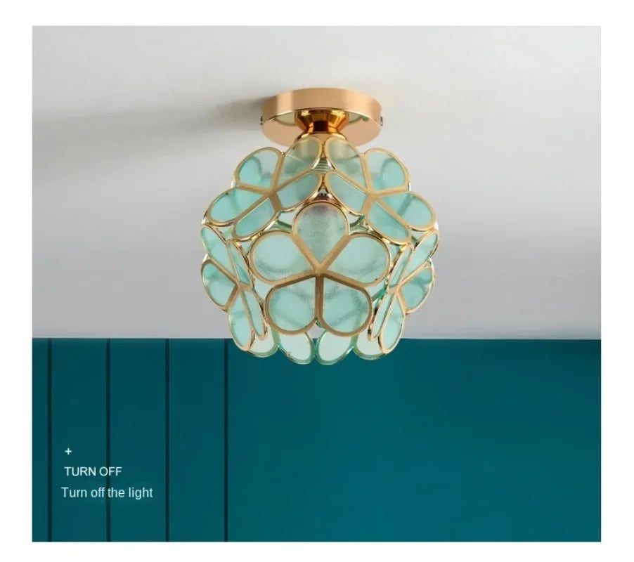 Nordic modern petal acrylic pendant lamp with gold tone and mint green glass petals for bedroom or restaurant lighting