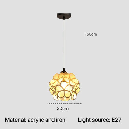 A warm glowing nordic modern pendant lamp with yellow translucent acrylic petals and an iron frame for bedroom lighting