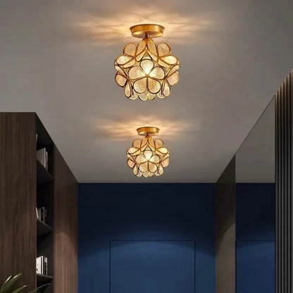 Gold-toned nordic modern petal acrylic pendant lamp with textured translucent glass panels for bedroom and restaurant lighting