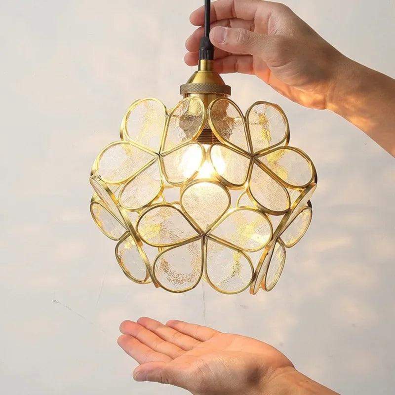 Gold-toned nordic modern pendant lamp with spherical textured glass petals for bedroom bedside or restaurant lighting