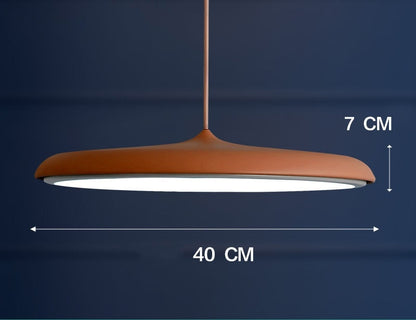 Copper-colored pendant light with matte finish and modern design featuring three color temperature for restaurant use