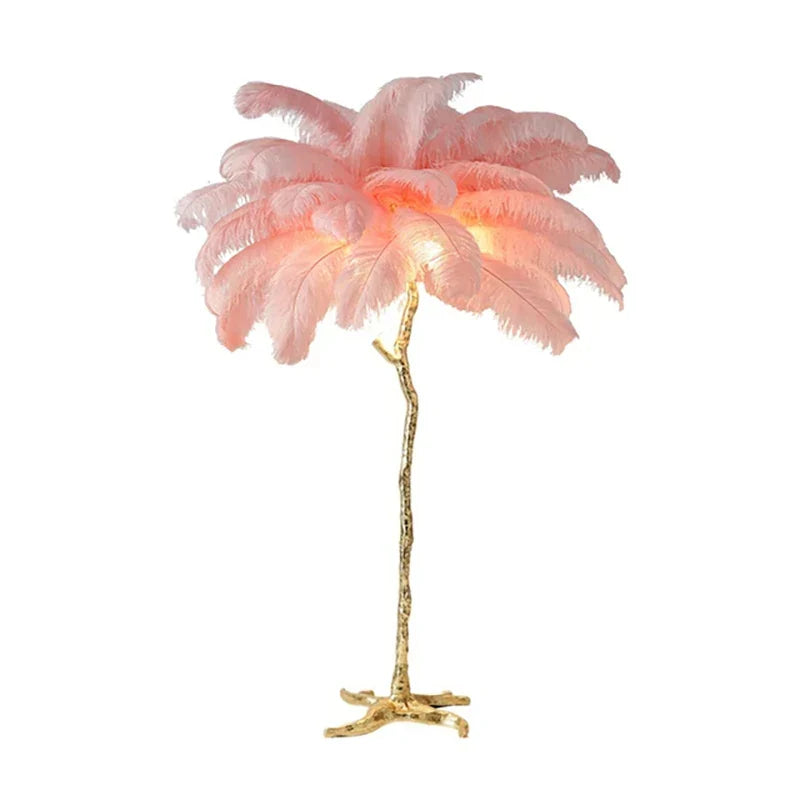 Delicate pink ostrich feather floor lamp with golden branch-like stand for living room and bedroom decor