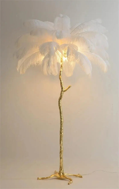 White feather floor lamp with gold-toned branch-like stand for living room and bedroom home decor lighting