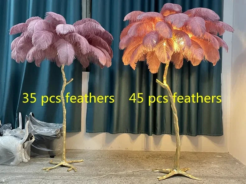 Two ornate nordic feather floor lamps with golden bases featuring pink and peach ostrich feathers for living room decor