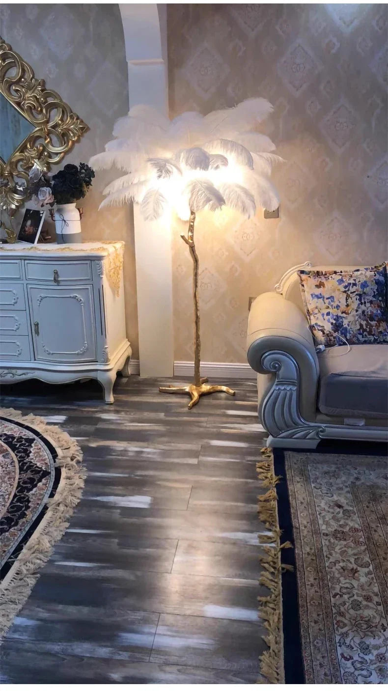 White feather floor lamp with golden base and stem for living room sofa background and bedroom bedside lighting