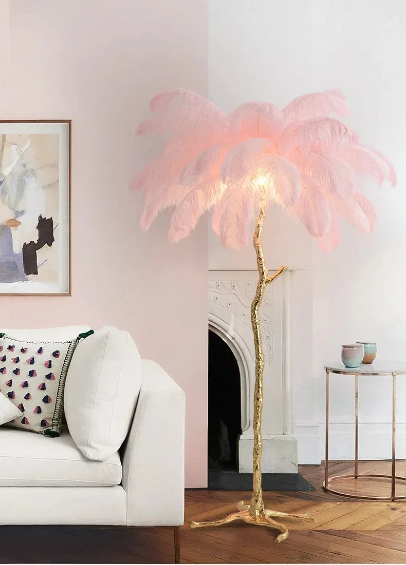 Delicate pink feather floor lamp with golden tree-like base for living room sofa and bedroom bedside lighting