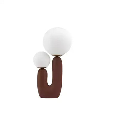 Brown u-shaped base ball table lamp with two white glass ball shades for bedroom decor