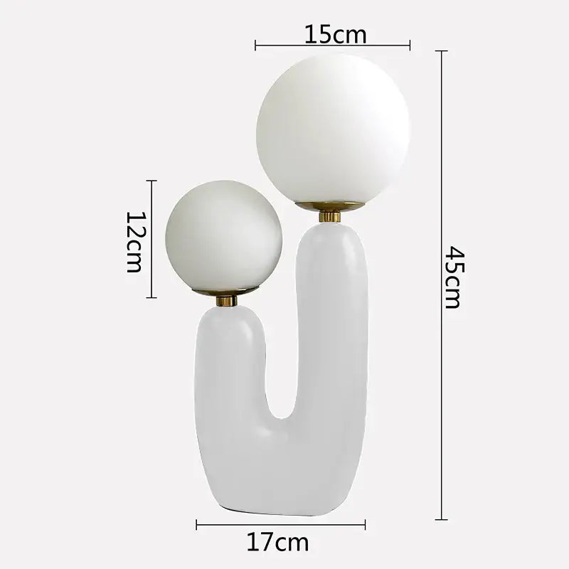 Modern white ceramic ball table lamp with two spherical glass ball shades and gold-toned metal accents for bedroom decor