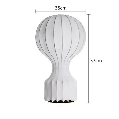 Nordic ribbed white silk table lamp with a bulbous upper section and fluted base for bedroom decor