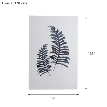 Minimalist nordic style inch fixture wall art featuring two dark gray stylized banana leaf prints on light gray background