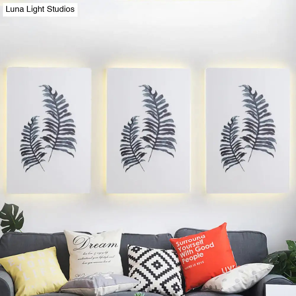 Set of three nordic style banana leaf inch fixture fern wall art pieces with black ink designs on white canvas and led backlighting