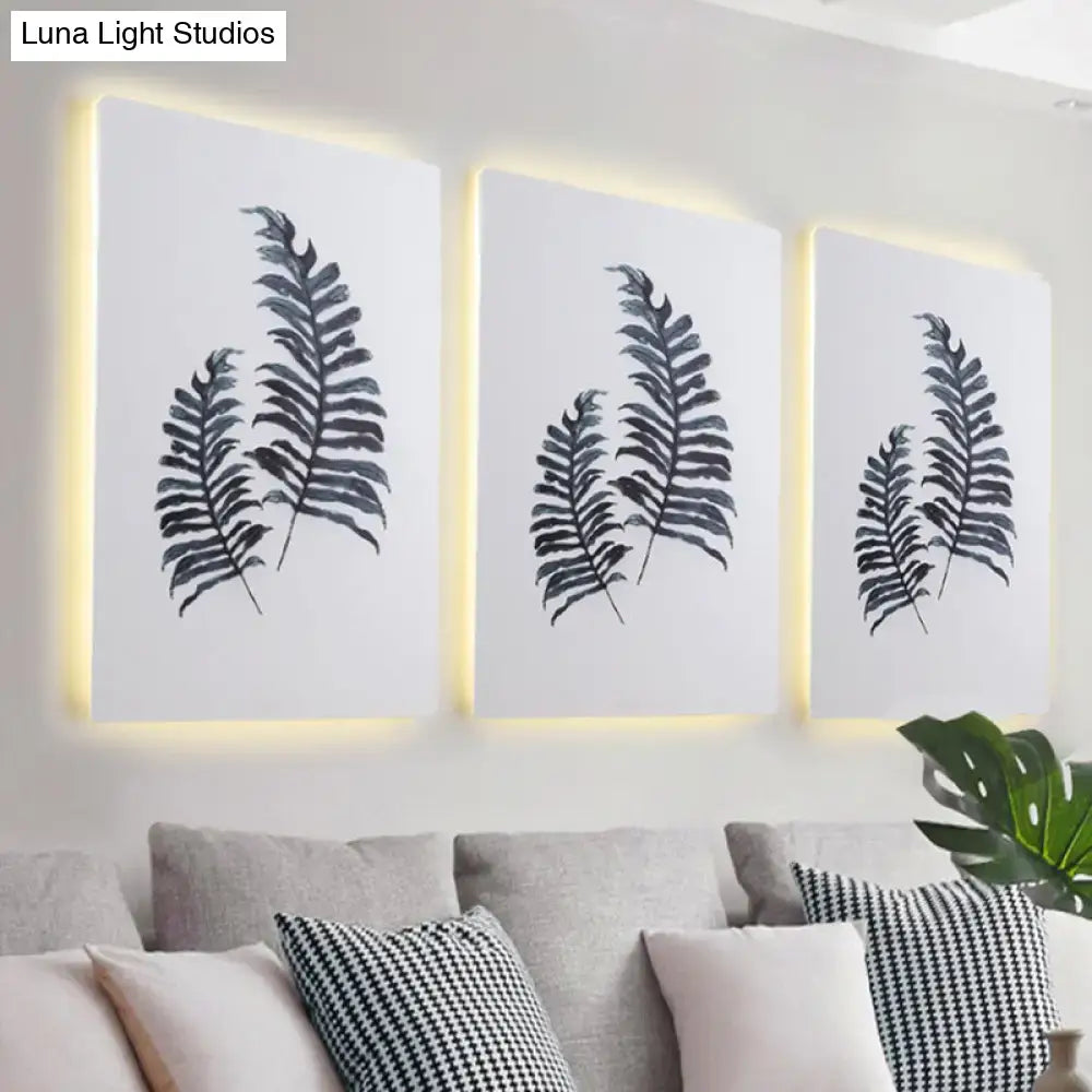 Three framed black-and-white banana leaf prints with warm backlighting in nordic style 24 inch fixture wall art