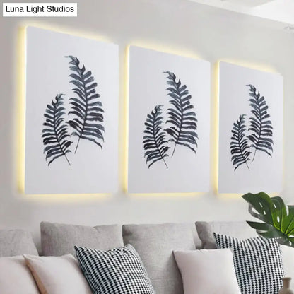 Three framed black-and-white banana leaf prints with warm backlighting in nordic style 24 inch fixture wall art