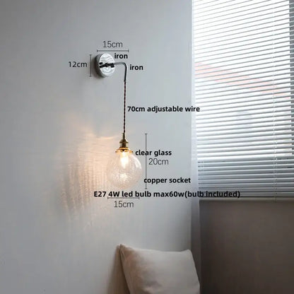 Clear glass globe ceramic led wall light with copper socket and adjustable iron arm for bedroom decorbites ceramic led wall