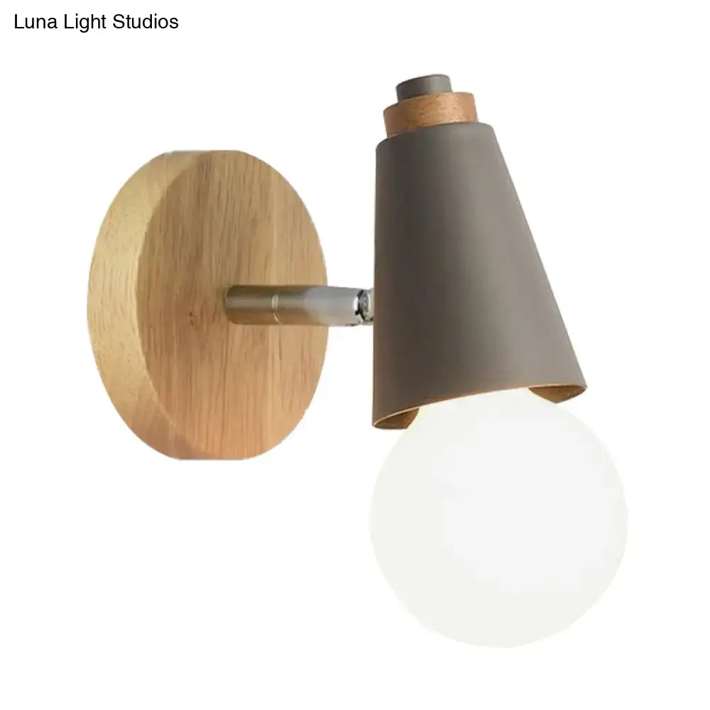 Modern nordic sweet cone wall light with circular oak backplate, matte gray shade, cork accents, and exposed frosted bulb