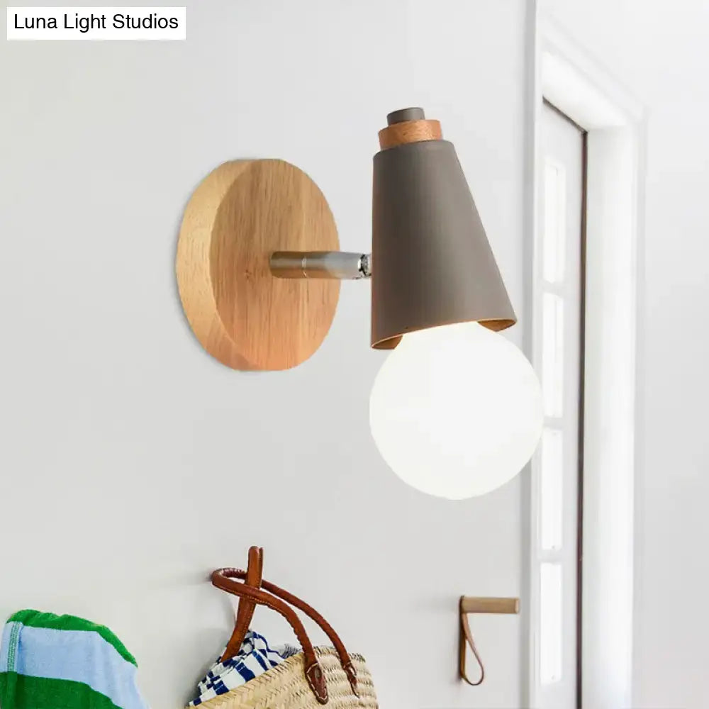 Modern nordic sweet cone wall light with circular wooden backplate, matte gray cone shade, copper ring, and frosted bulb for bedroom