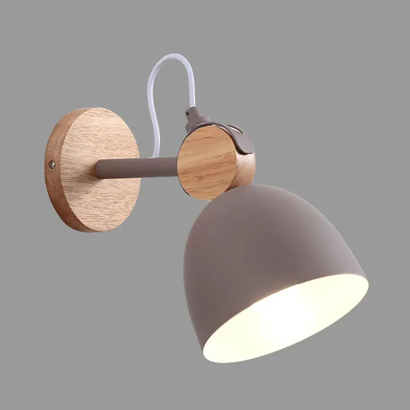 Nordic white and wood wall lamp with angle adjustable domed shade, matte gray metal, and light wood accents for bedroom