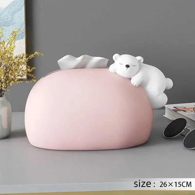 Pink ceramic tissue box with a white ceramic polar bear figurine resting on top for living room decor bear statues tissue