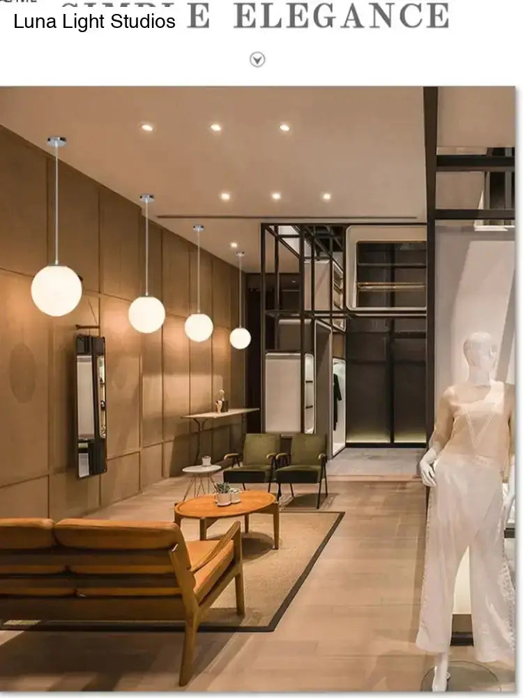 Modern pendant lights featuring nordic white glass ball design with matte finish for living room and restaurant use