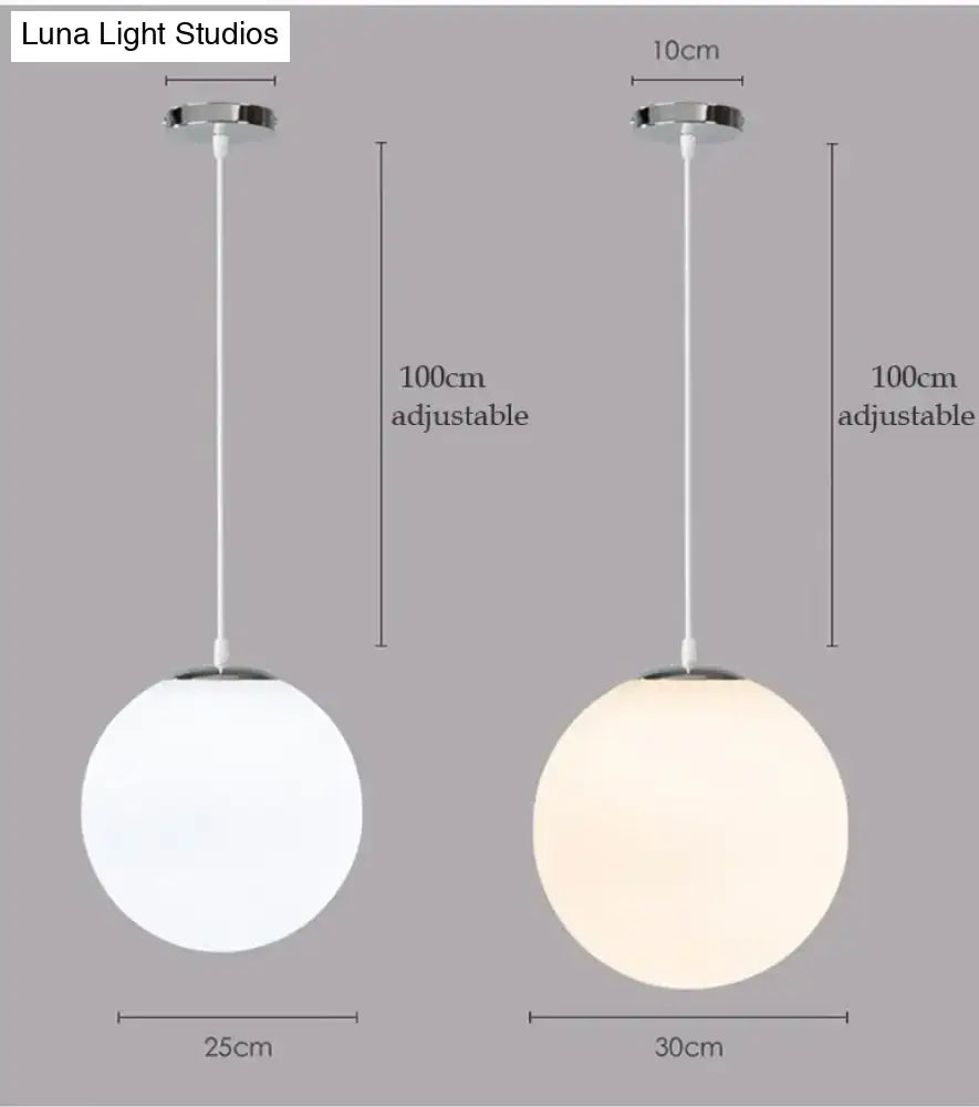 Modern decorbites™ pendant lights featuring nordic white glass ball with frosted globe and chrome ceiling mount