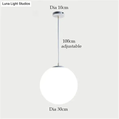 DecorBites nordic white glass ball pendant lights with frosted glass globe and polished chrome for modern living rooms