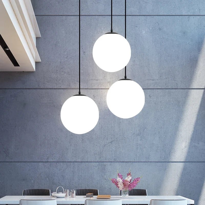 Nordic White Glass Globe Pendant Light With Iron Finish - Decorbites