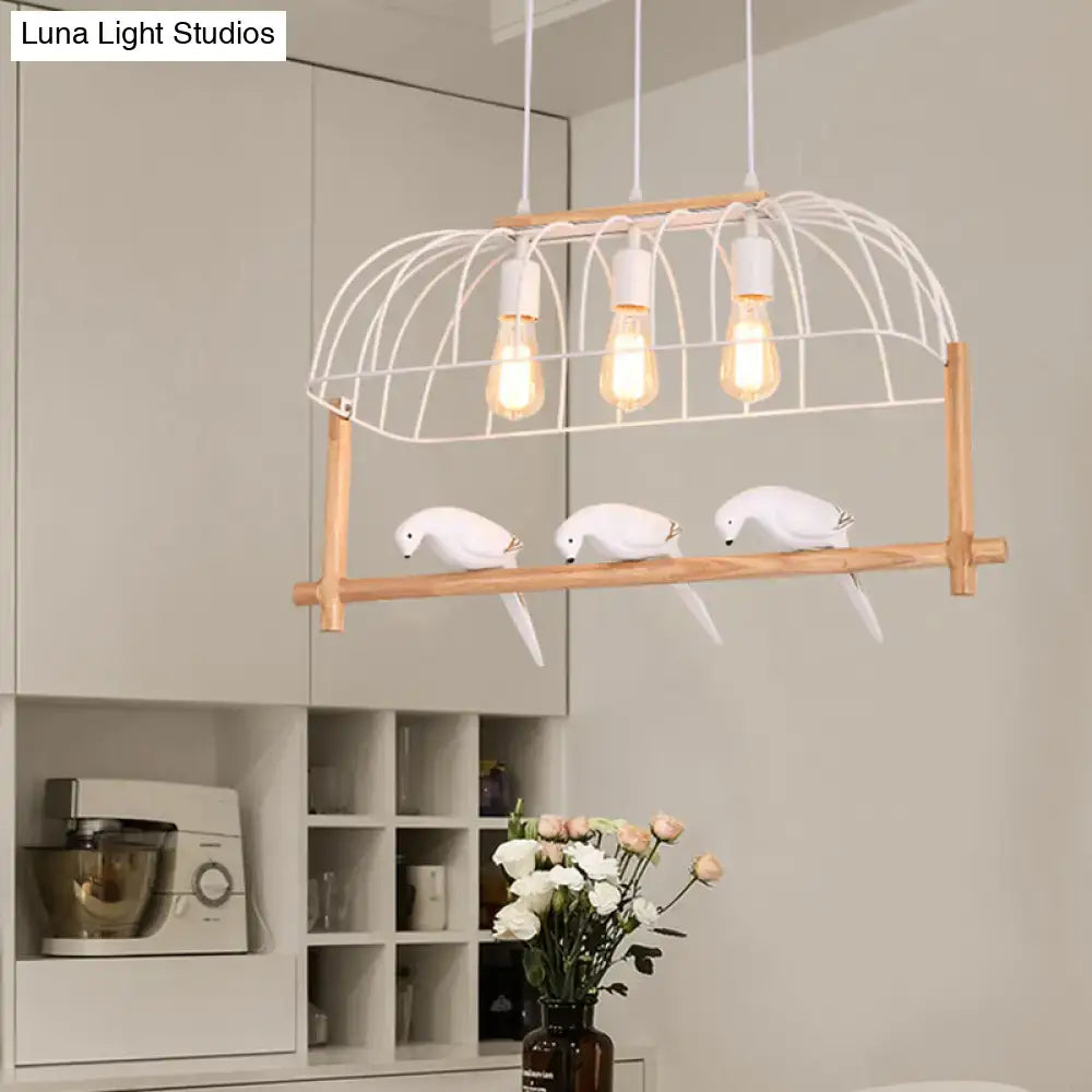Decorbites™ nordic style island pendant with elongated white iron cage and wooden frame featuring three white parrot figurines on shelf fixture width and height suitable for islands