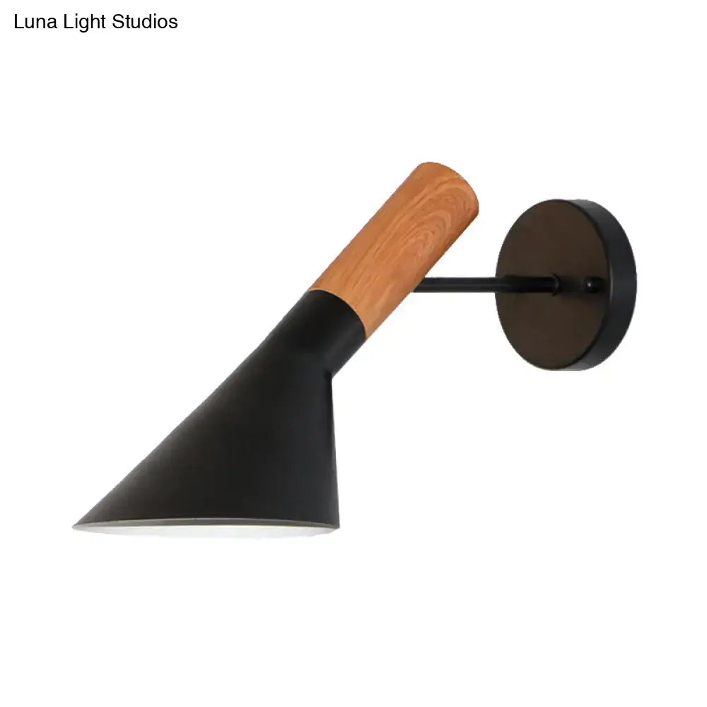Modern black and wood wall light with a sleek conical shade and wood handle for bedroom monochrome wall light single