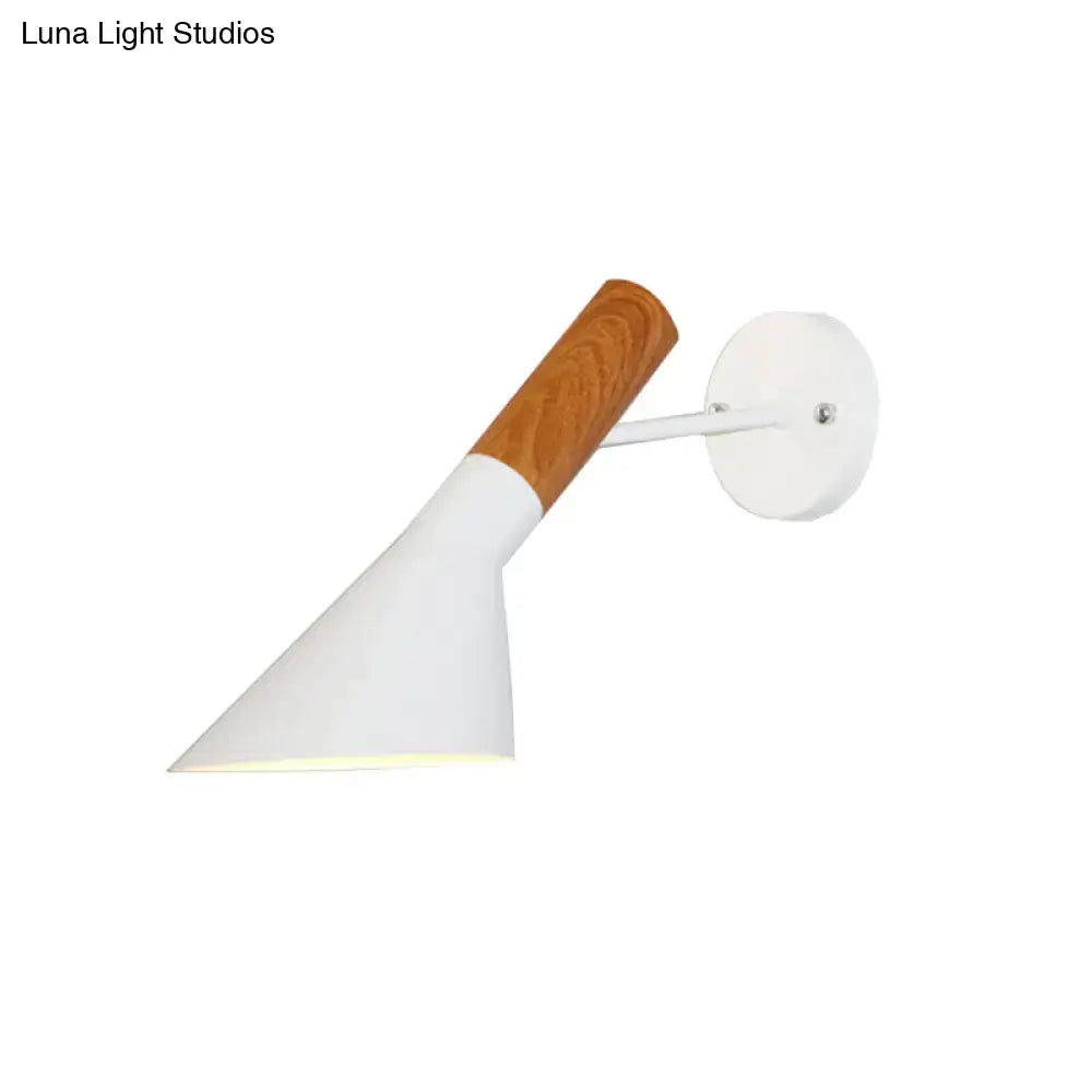 Modern wall light single with white conical shade, wooden handle, and circular mounting plate for bedroom use