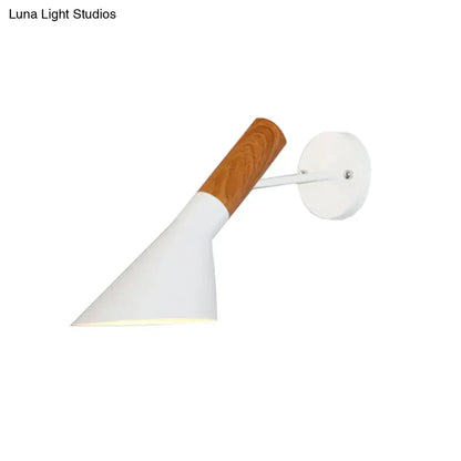 Modern wall light single with white conical shade, wooden handle, and circular mounting plate for bedroom use