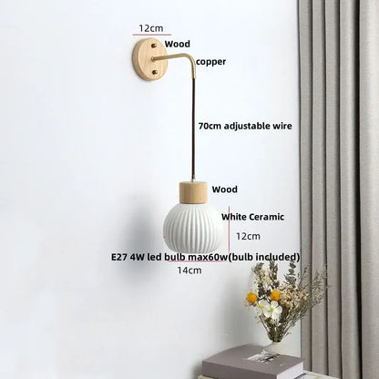 Nordic white ribbed ceramic wood wall sconce with a minimalist design featuring copper wire and wooden accents decorbites ceramic wood
