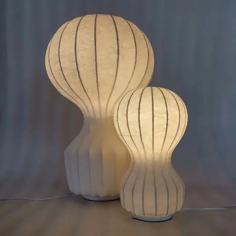 Two cream-colored decorbites gatto silk table lamps with black stripes in hot air balloon shape for bedroom decor