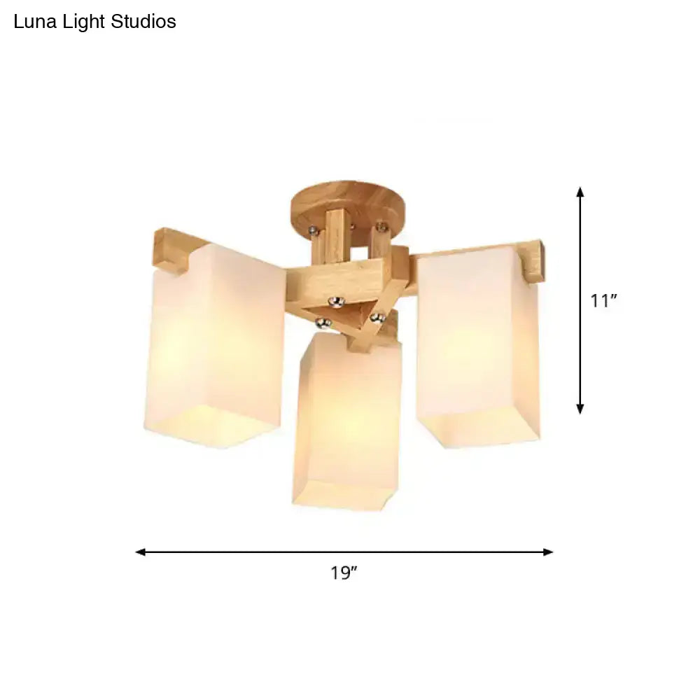 Lightweight bamboo ceiling lamp with three cuboid cream glass shades for living room lighting