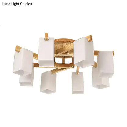 Modern ceiling lamp with light wood frame and cuboid cream glass shades for stylish living room lighting