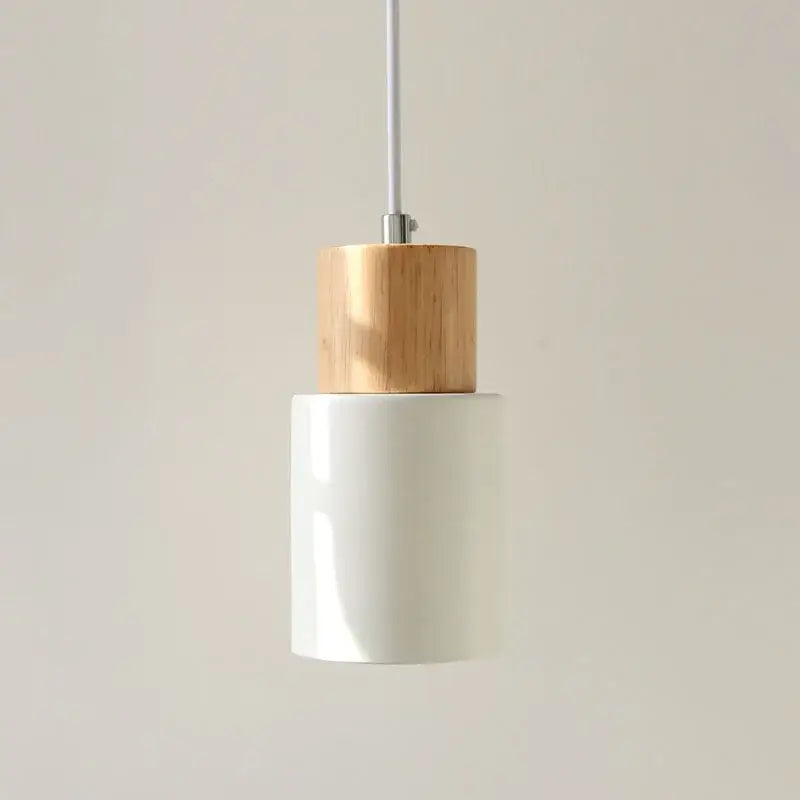 Nordic wood and metal single pendant light with cylindrical white ceramic body and solid wood top for kitchen use