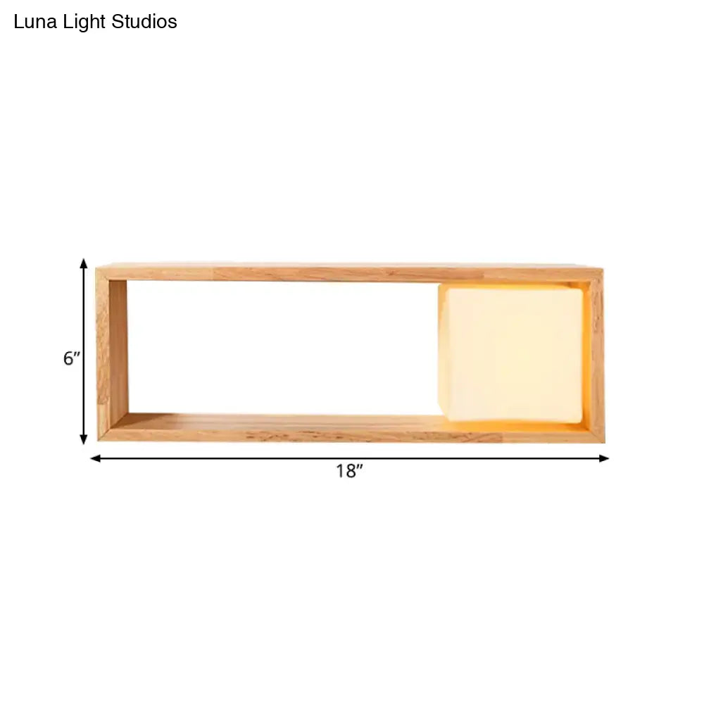 Nordic wood wall lamp with rectangular wooden shelf and warm glowing light panel featuring led bulb base