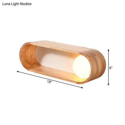 A sleek light-brown bamboo nordic wood wall lamp with shelf featuring warm interior glow and e27 bulb base type