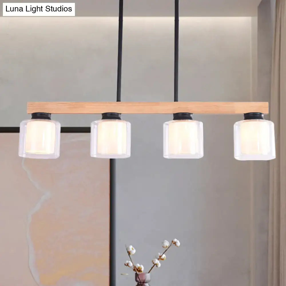 DecorBites Nordic wooden linear pendant with natural wood bar and black metal hardware for restaurant island lighting