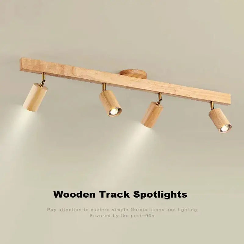 Light beige nordic woodentrack led ceiling spotlight with four cylindrical wooden fixtures for living room use