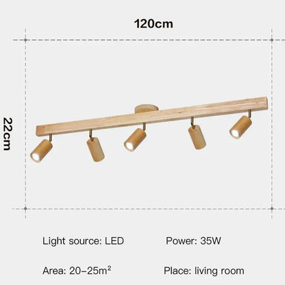 Minimalist nordic woodentrack led ceiling spotlight with five cylindrical bamboo-style fixtures on a natural wood bar