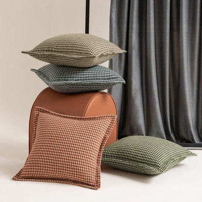 Stacked olive and cream houndstooth jacquard pillow covers in earthy tones with textured woven fabric for living room decorbites cushion covers